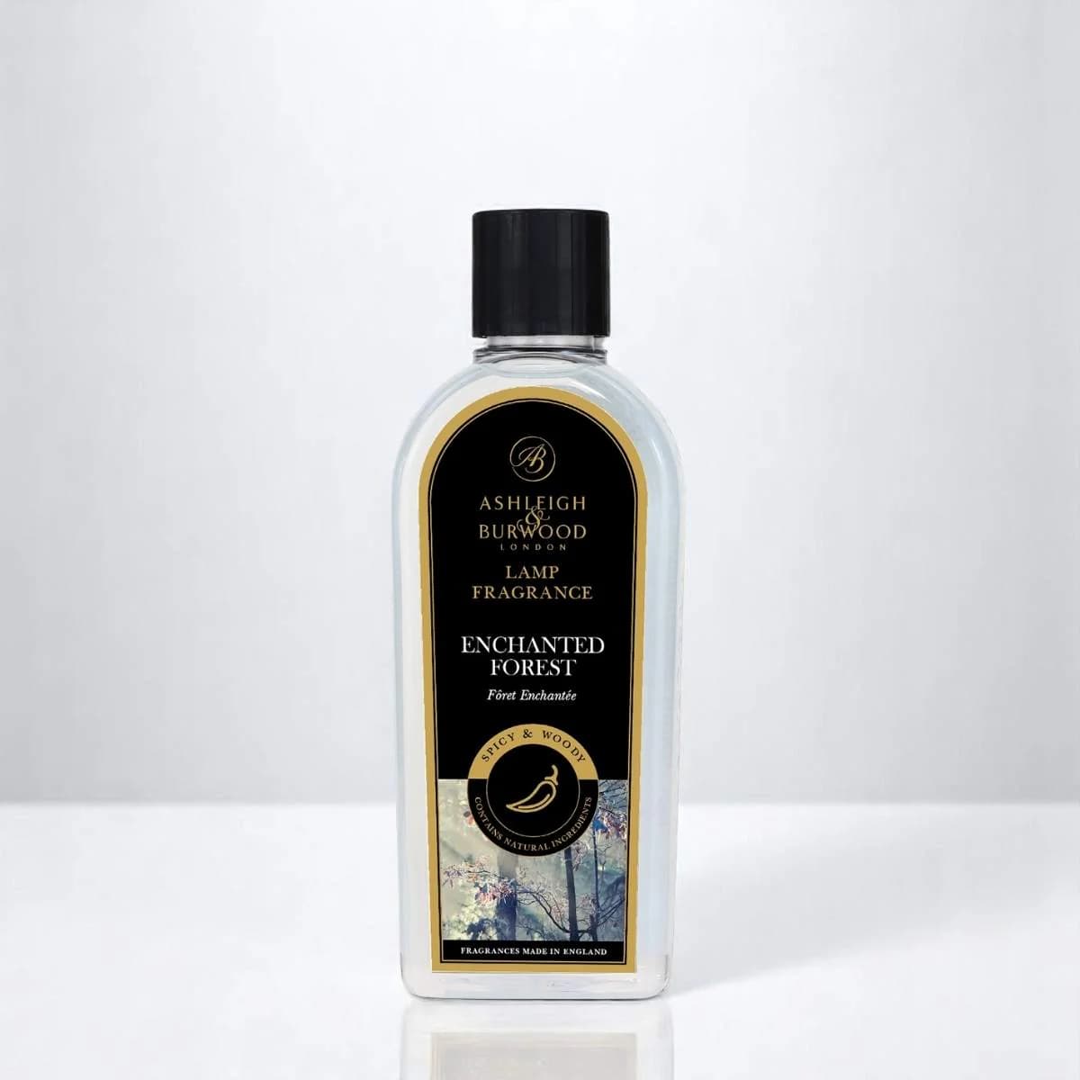 A bottle of Ashleigh & Burwood Enchanted Forest Lamp Fragrance on a white background