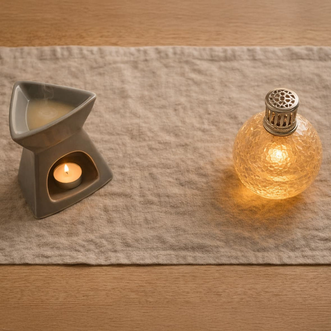 Wax warmer and fragrance lamp displayed side by side to show different home fragrance methods.