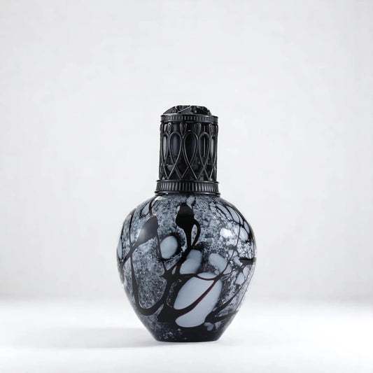 A decorative Ashleigh & Burwood Black Marble fragrance lamp shown on a white back ground