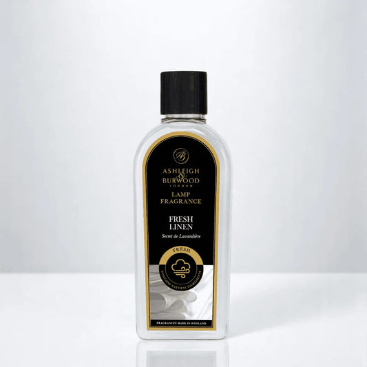 Bottle of Ashleigh & Burwood Fresh linen lamp fragrance on a white background